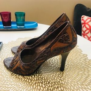 Brown leather and laser cut peep toe heel